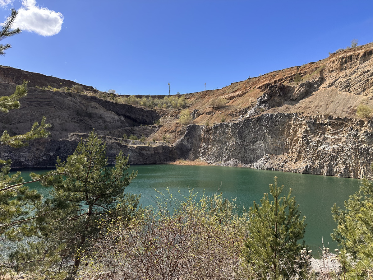 The Emerald Lake in Racos looks like an oasis in the middle of a volcano crater